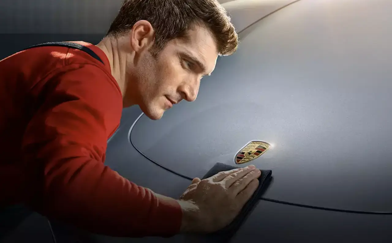 Service - Porsche Service Technician Cleaning Vehicle - Feature Image